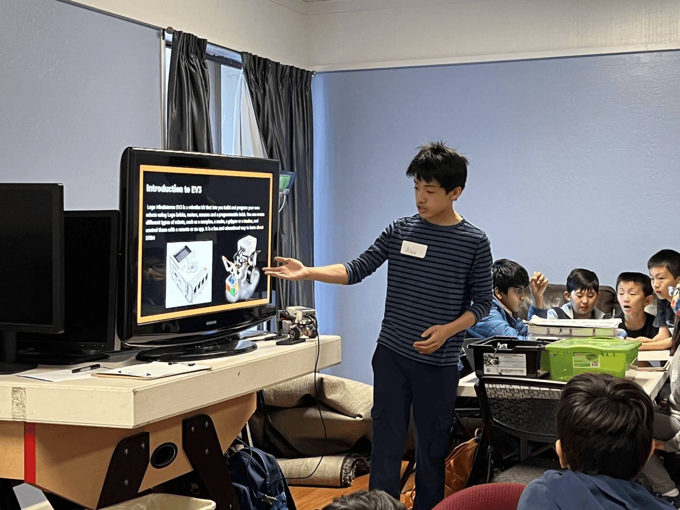 BASA student leader teaching an EV3 robotics lesson